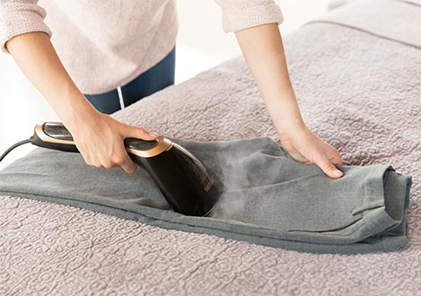 Handheld steamer with vertical & horizontal steaming